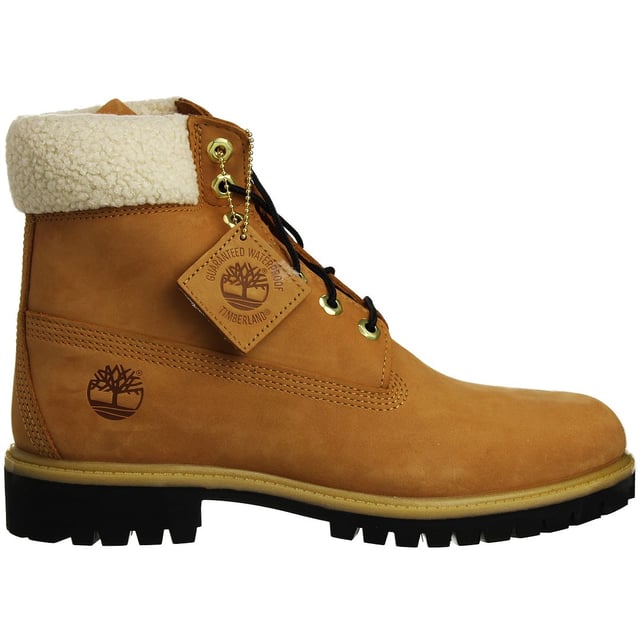 The Timberland 6-Inch Premium Men's Boots are a classic and rugged choice for men who appreciate durable and stylish footwear. Here are the key features of these boots:

 Brown Nubuck Leather:  These boots are typically constructed with premium brown nubuck leather, which is known for its durability and resistance to wear and tear. Nubuck leather provides a soft and velvety texture.

 Classic 6-Inch Height:  The 6-inch height is a signature feature of Timberland boots. It provides ankle support and protection, making them suitable for various outdoor activities.

 Waterproof Construction:  Timberland is renowned for its waterproof boots, and the 6-Inch Premium Boots are no exception. They often feature seam-sealed construction and waterproof leather to keep your feet dry in wet conditions.

 Padded Collar and Tongue:  These boots come with a padded collar and tongue for enhanced comfort and to reduce the risk of chafing or discomfort during extended wear.

 Lace-Up Closure:  The boots typically feature a lace-up closure system with rustproof hardware, allowing for a secure and customized fit and ensuring durability over time.

 Anti-Fatigue Technology:  Some Timberland boots, including the 6-Inch Premium line, feature anti-fatigue technology in the midsole. This technology provides all-day comfort and support, especially during long walks or hikes.

 Rubber Lug Outsole:  The rugged rubber lug outsole offers excellent traction and grip on various surfaces, making these boots suitable for outdoor adventures.

 Versatile Use:  While originally designed for outdoor and workwear, these boots have become a fashion statement and can be worn in various casual and urban settings.

 Timberland Branding:  These boots feature Timberland branding details, such as the iconic Timberland tree logo on the side and embossed branding on the tongue, representing the brand's reputation for quality and style.

In summary, the Timberland 6-Inch Premium Men's Boots are a durable and stylish choice for men who want both fashion and function in their footwear. With their waterproof construction, comfortable features, and iconic design, they are a versatile addition to your wardrobe, suitable for both outdoor activities and everyday wear. These boots are a classic symbol of Timberland's commitment to quality and rugged style.