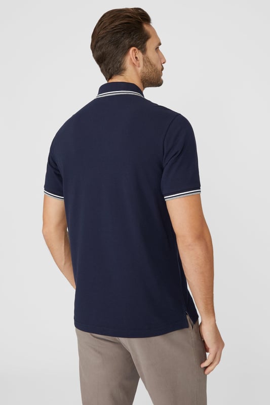 Introducing our Pique Tipped Polo, the perfect addition to any man's smart casual wardrobe. Crafted with meticulous attention to detail, this polo offers a sophisticated and polished look. The pique fabric provides a comfortable and breathable feel, making it ideal for all-day wear. With its stylish tipped collar and cuffs, this polo adds a touch of elegance to any outfit. Whether you're heading to the office or out for a casual gathering, our Pique Tipped Polo is the ultimate choice for a smart and effortlessly stylish look.