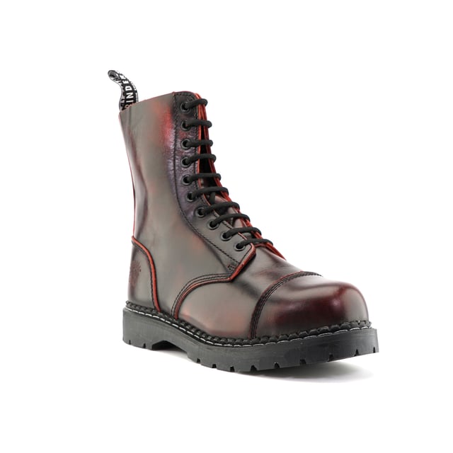 The Stag ACS, a celebrated staple of Grinders' original lineup, has maintained its status as a best seller with its 2015 update. This updated model features a 10-eyelet lace system for a secure fit and is reinforced with a steel toe cap certified to EN ISO 20345:2011 SB standards for enhanced safety. The boot's padded insole provides added comfort, while its durability is assured by a chunky, oil-resistant rubber sole that is Goodyear welted for long-lasting wear. Additionally, the Stag incorporates Grinders' Air Cushioned Soles (ACS) for superior comfort. A branded pull loop at the boot's opening ensures ease of wear and removal. 10 Eyelet Derby Boot, Steel Toe (Certified EN ISO 20345:2011 SB), Goodyear Welted, Grinders’ Air Cushioned Soles (ACS), Leather Uppers