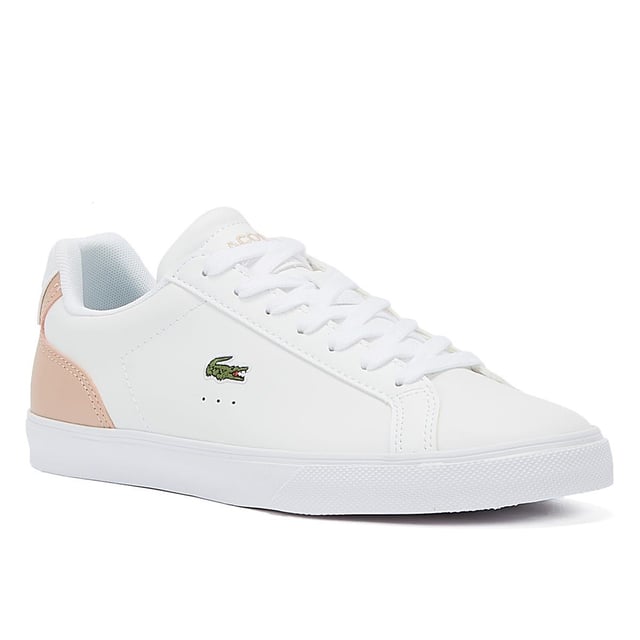 The Lacoste Lerond Pro BL23 1 CFA Women's White/Ltl Pink Trainers are crafted from high-quality leather and feature a clean white colorway with a subtle pop of light pink that adds a touch of playfulness. The design of the Lerond Pro BL23 1 CFA trainers is sleek and streamlined  with a low-cut profile that offers a modern look. The Lacoste crocodile logo is embroidered on the side of the shoe  adding a touch of brand recognition and flair. The shoe also features a cushioned insole for added comfort and support during prolonged wear. These trainers are versatile and suitable for a range of occasions  from casual outings to more formal settings. They can be paired with a variety of outfits  from jeans to dresses  to add a touch of sports-inspired style.