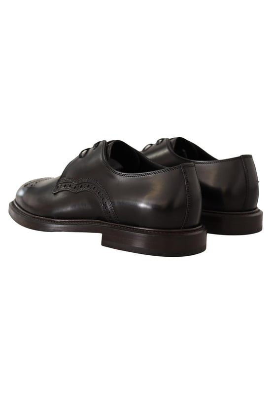 Dolce & Gabbana Men's Black Leather Dress Formal Derby Shoes Model: Dress derby shoes
Color: Black
Material: 100% Calfskin Leather
Rubber sole
Logo details
Made in Italy
Very exclusive and high craftsmanship