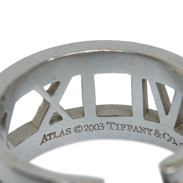 VINTAGE. RRP AS NEW. The Atlas ring features a roman numerals in white gold-tone hardware with diamonds.Exterior Front Discolored, Scratched. Exterior Back Scratched. Exterior Bottom Scratched. Exterior Top Scratched. 

Dimensions:
Length 6cm
Width 2cm

Original Accessories: This item has no other original accessories.

Color: Silver
Material: Metal x White Gold
Country of Origin: Italy
Boutique Reference: SSU234791K1342


Product Rating: GoodCondition

Certificate of Authenticity is available upon request with no extra fee required. Please contact our customer service team.