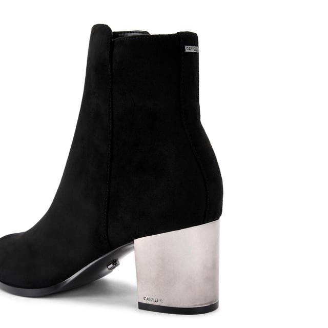 This Royale Ankle boot features a black microsuede upper with statement silver block heel.