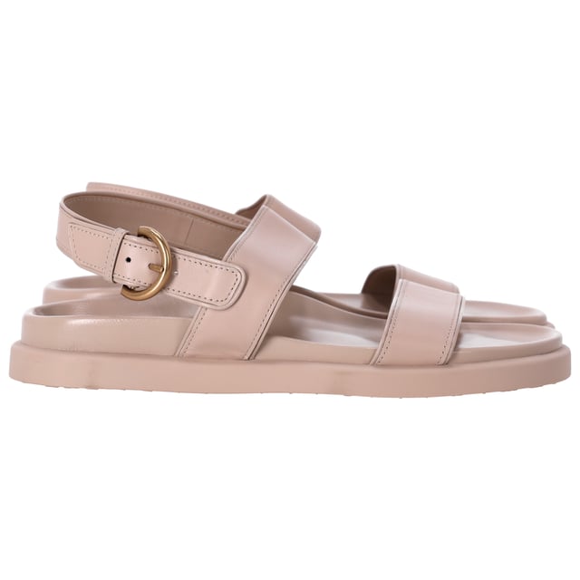 VINTAGE, RRP AS NEW
Complete your summer wardrobe with the Gianvito Rossi Bilbao Sandals in Beige Leather, a versatile and sophisticated pair that will elevate your warm-weather looks. Handmade in Italy from smooth calf leather, these sandals boast a refined and timeless design. The simple silhouette is enhanced with buckled ankle straps for a secure fit and contoured insoles for maximum comfort, ensuring you can wear them all day with ease.


Gianvito Rossi Bilbao Sandals in Beige Leather
Condition: Excellent
Signs of wear: No visible sign of wear. No Mark at insole.,  Very light mark at soles.
Packaging: None
Color: Beige
Material: Leather | leather
Size: EU39/US9
Measurements: Insole length: 250
SKU: NAPPUUSSH403503W