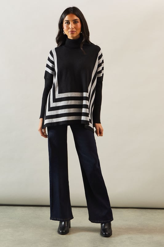 Chic striped roll neck poncho design
        Oversized, relaxed fit for ultimate comfort
        Elegant contrasting stripe pattern
        Long sleeves with dropped shoulders
        Versatile length suitable for various styling options
    
    Embrace sophistication and comfort with this striking striped roll neck poncho from Wallis. The oversized silhouette offers a relaxed fit, perfect for those who appreciate both style and ease. The elegant contrasting stripe pattern adds visual interest, while the long sleeves with dropped shoulders contribute to its laid-back charm. Ideal for casual events and family gatherings, this versatile piece can be styled effortlessly. Pair it with slim-fit trousers and ballet flats for a polished daytime look, or layer it over a fitted dress with ankle boots for a more refined ensemble. The poncho's adaptable length allows for various styling possibilities, making it a wardrobe staple for the fashion-forward woman who values both glamour and practicality in her everyday attire.