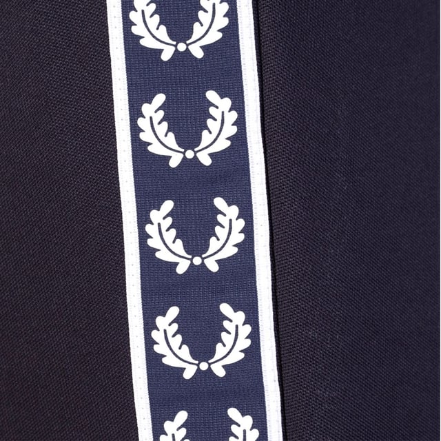 Fred Perry T3515 608 Tape Track pants Navy Blue Sweat Pants. Fred Perry Navy Blue Pants. 2 Side Pockets, 54% Polyester, 46% Cotton. Drawstring Waistband. Fred Perry Logo Down Legs. Style Code: T3515 608
