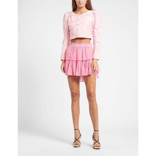 LoveShackFancy encapsulates feminine  romantic and vintage inspired designs with their use of fine lace detailing  elegant prints and soft hues. Founded in 2013  the brand has gained global appeal for its flattering silhouettes  hand dyed fabrics and designs  inspired by founder Rebecca Hassel Cohen's immersive travels. These elements are shown perfectly in this Ruffle Mini Skirt which comes in a pink colourway and tiered design  the perfect addition to your Summer wardrobe. Details: pink colourway  cotton construction  elasticated waistband  tiered design  drop hem  mini length  regular fit and finished with a polka dot design. Cold wash only.