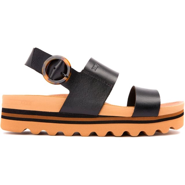 Experience Luxury In Summer Style With The Reef Cushion Vista Hi Buckle Platform Sandals. The Vegan Upper, Adjustable Back Strap And Ample Arch Support Give Your Feet A Comfy Ride. The Platform Sole And Heel Cup Offer Stability And Comfort. These Black Sandals Combine Fashion And Function. Feel Good And Look Fab With The Reef Cushion Vista Hi Buckle Sandals.