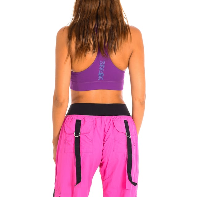 Zumba-Sport-Top.
 Flieder
 Ein Top aus komprimierendem Stoff.
 Gekreuzter Rücken.
 Innenfutter.
 weicher Stoff
 Grafik mit Markenmotiven.
 Nähte in Ton gehalten.

 Zusammensetzung: 90% Nylon, 10% Elasthan.

 -In der Waschmaschine bei einer Temperatur von maximal 30º waschen.
 -Nicht in den Trockner geben.
 -Keine Bleichmittel verwenden.
 -Kein Bügeleisen verwenden.
 Zusammensetzung: 90% Nylon, 10% Elastan.
 Pflege:
-Waschmaschine bei maximaler Temperatur von 30º benutzen.
 -Nicht in den Trockner geben.
 -Keine Bleiche verwenden.
 -Kein Bügeleisen verwenden.