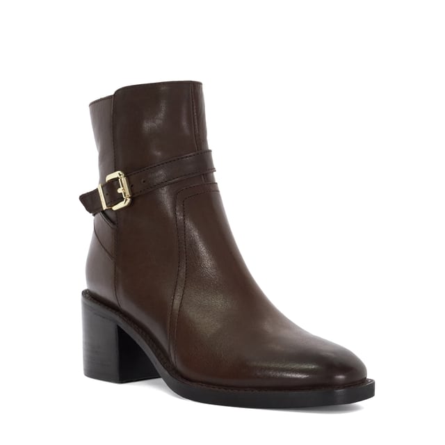 Designed with crossover straps and a shiny silver-tone buckle, Plotto is a must-have investment worthy style. Crafted from premium leather and boasting a block heel, these timeless boots are going to get you compliments every time you leave the house.