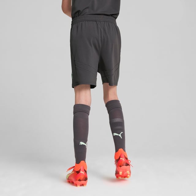 PRODUCT STORY: Hit the pitch like AC Milan's finest in these football shorts. They're made from sweat-wicking material to keep you cool in the tensest moments of the game and are finished with the team's famous crest on the leg. FEATURES & BENEFITS: dryCELL: Performance technology designed to wick moisture from the body and keep you free of sweat during exercise; As part of the RE:FIBRE program, this garment is made of at least 95% recycled material from textile waste and other used materials. DETAILS: Regular fit; 170 gsm, Jacquard; Medium rise; Official team branding; PUMA branding details; PUMA Youth: Recommended for older kids between 8 and 16 years.