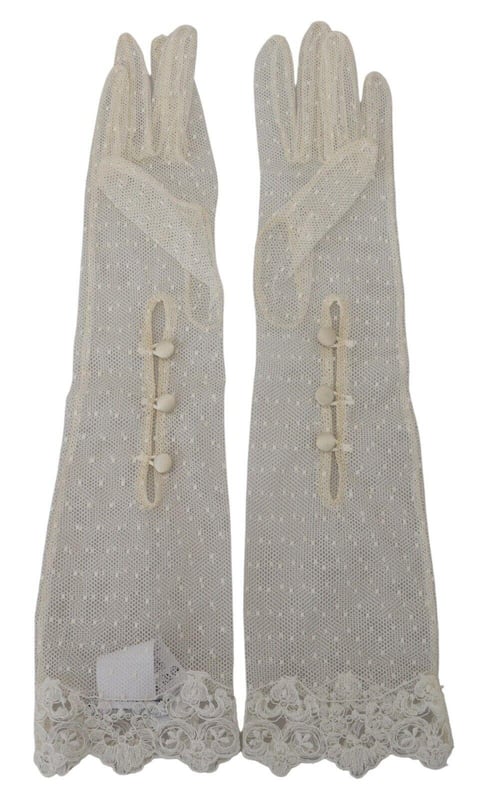 Gorgeous brand new Dolce & Gabbana elbow length gloves
  Made in Italy
  Logo details
  Crafted with high craftsmanship
  Material: 90% Cotton 7% Viscose 3% Nylon
  Rare and stylish
  Perfect for adding sophistication to any outfit