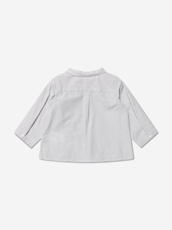 Bonpoint embody mesmeric concepts in their sophisticated aesthetics. These baby boys shirt captures the French label's dedication to high quality and impeccable construction. Made in eco-friendly cotton with a top pocket and button fastening on a straight hem. He will emanate unparalleled elegance.  Organic Cotton Collar  Top Pocket Bonpoint Cherry Tag  Straight HemBonpoint : Baby Height