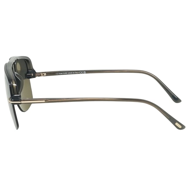 Tom Ford Hugo-02 FT1003 51B Black Sunglasses. A touch of fun for your summer days, but nothing too out of the ordinary for a Tom Ford collectible. Tom Ford Black Sunglass perfect for the summer.. Made In Italy, Tom Ford Black Sunglass, Lens Width = 63mm, Nose Bridge Width = 11mm, Arm Length = 145mm. Branded Sunglasses Case and Cleaning Cloth Included. 100% Protection Against UVA & UVB Sunlight and Conform to British Standard EN 1836:2005, Sunglasses, Sunglasses Case, Cleaning Cloth and Care Instructions all Included. Tom Ford FT1003 51B Sunglasses