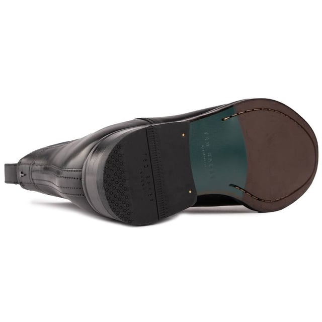 Step Into Pure Luxury With The Lineus Chelsea Boot From Ted Baker. With A Geometric Elastic Panel On The Ankle, These Classic Chelsea Boots Add A Contemporary Twist To A Classic Style. High-quality Top-grain Leather And A Comfortable Fit Make Them Perfect For Any Occasion, Whether You're Dressing Up Or Down, Adding A Sophisticated Flair To Your Looks.