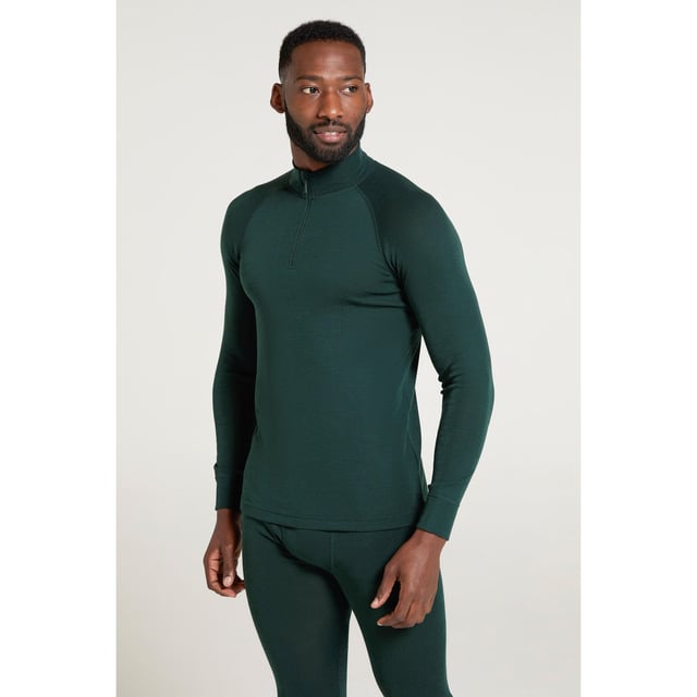 80% Merino Wool, 20% Polyester. Fabric: Performance. Design: Plain. Fastening: Half Zip. Neckline: High-Neck. Sleeve-Type: Long-Sleeved. Fabric Technology: Anti-Bacterial, Breathable, Lightweight, Moisture Wicking. XXS, XS: 33 in. S: 37 in. M: 40 in. L: 43 in. XL: 46 in. XXL: 49 in. 3XL: 53 in. 4XL: 56 in.