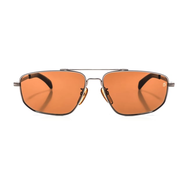 7049GS Metal Frame Sunglasses

 Shape and design:
 - These David Beckham glasses have a rectangular silhouette.

 Frame material:
 - The frame of these glasses is made of metal.
 - The use of metal provides durability and lightness to the frame.
 - This makes the glasses durable and comfortable to wear.

 Metal temples:
 - The temples are also made of metal, matching the frame material.
 - The metal on the temples adds solidity and stability to the structure of the glasses.

 Brand details:
 - DB brand engraving on the lens.
 - These design elements help to clearly identify the model as part of the David Beckham eyewear collection.

 Glasses:
 - The lenses are of high quality.
 - These lenses provide excellent UV protection and sharp, clear vision.
 Measures: Lens height: 40 mm. Lens width: 59 mm. Bridge: 15 mm. Temples: 145 mm.
 Composition: Metal
 Care:
Use a soft, clean microfiber cloth to clean your sunglasses. This type of cloth will not scratch the lenses.
 Avoid using abrasive cleaning products, detergents, alcohol or acetone, as they can damage lenses and anti-reflective treatments.