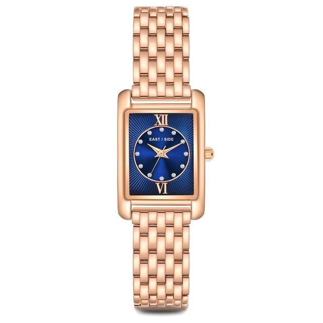 GENERAL INFORMATION:  • Targetgroup: Female  • Wristwatch: No Special Functions  • Display: analogue  • Weight of watch w/o box (gr.) - approx.: 55,0  MOVEMENT:  • Movement: Quartz  • Term of Movement: 2035  • Origin of movement: Japan  BRACELET:  • Material of bracelet/strap: Metal (Alloy)  • Plating of bracelet/strap: Ion-Plating (IP)  • Finishing of bracelet/strap: Smooth  • Finishing/Decoration of bracelet/strap: None  • Clasp/Closure/Buckle: Security-folding clasp  • Color of bracelet/strap: Rosegold  • Length of bracelet/strap (mm) approx.: 210,0  • Width of bracelet/strap (mm) approx.: 13,4  • Style/Design of bracelet/strap: Link bracelet  • Bracelet/strap adjustable?: No  CASE:  • Shape of case: Rectangular  • Size/Diameter of case in mm . approx.: 20,5 x 30,8  • Height of case in mm: 8,4  • Case material: Metal (Alloy)  • Surface of case: Polished  • Bezel/Topring: Fixed  • Finishing/Decoration of case: None  • Material of case back: Stainless steel  • Lock of case back: No screwed-in crown  • Color of case: Rosegold  • Coating/Plating (Case): Ion-Plating (IP)  • Type/Form of crystal: Flat  • Material of crystal: Mineral crystal  DIAL:  • Size jewelry care cloth: Hour, Minute, Second  • Indices: Roman numerals/points  • Material of dial: Brass  • Structure/pattern of dial: Flat/sunray  • Color of dial: Blue  PUSHER, CROWN, HAND:  • Pusher: None  • Corrector: No  • Crown: No screwed-in crown  • Type of hands: Dauphine hands  • Luminescent (hands): No  PACKAGING & SCOPE OF DELIVERY:  • Box: Yes  • Service booklet: Yes  • Manual: Yes