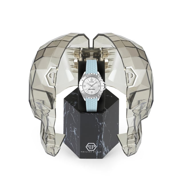 This Philipp Plein Plein Heaven Analogue Watch for Women is the perfect timepiece to wear or to gift. It's Silver 38 mm Round case combined with the comfortable Blue Silicone watch band will ensure you enjoy this stunning timepiece without any compromise. Operated by a high quality Quartz movement and water resistant to 5 bars, your watch will keep ticking. Philipp Plein’s Heaven watches represent the epitome of sophistication and technical mastery within the world of luxury timepieces. This Analogue watch has a  function: Luminous Hands High quality 19 cm length and 18 mm width Blue Silicone strap with a Buckle Case diameter: 38 mm,case thickness: 12 mm, case colour: Silver and dial colour: Silver