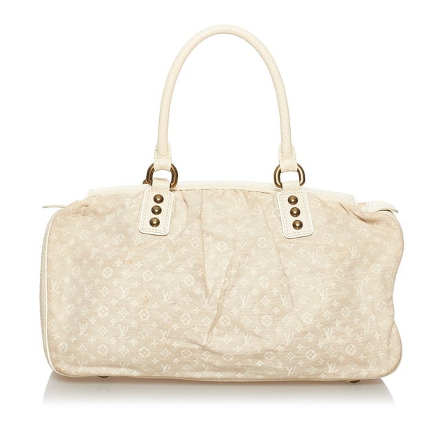 VINTAGE. RRP AS NEW. The Trapeze GM features a Mini Lin cotton body with leather trim, rolled leather handles, top magnetic snap button closure, and interior slip pockets.Exterior back is discolored and stained. Exterior bottom is out of shape and scratched. Exterior corners is scratched. Exterior front is discolored, scratched and stained. Exterior handle is out of shape, scratched and stained. Exterior side is scratched. Studs is scratched. Interior lining is stained.

Dimensions:
Length 21cm
Width 39.5cm
Depth 13cm
Hand Drop 17cm
Shoulder Drop 17cm

Original Accessories: This item has no other original accessories.

Serial Number: SR1025
Color: White x Ivory
Material: Fabric x Cotton x Leather x Calf
Country of Origin: France
Boutique Reference: SSU157288K1342


Product Rating: GoodCondition

Certificate of Authenticity is available upon request with no extra fee required. Please contact our customer service team.