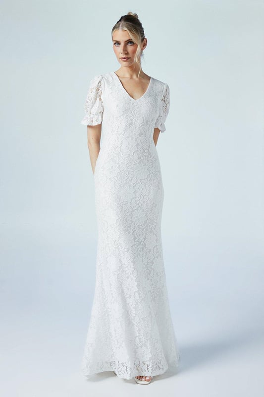 Romantic Wedding Gown with a Flattering Silhouette, Delicate Details, and Timeless Elegance for an Enchanting and Unforgettable Bridal Look main image 1