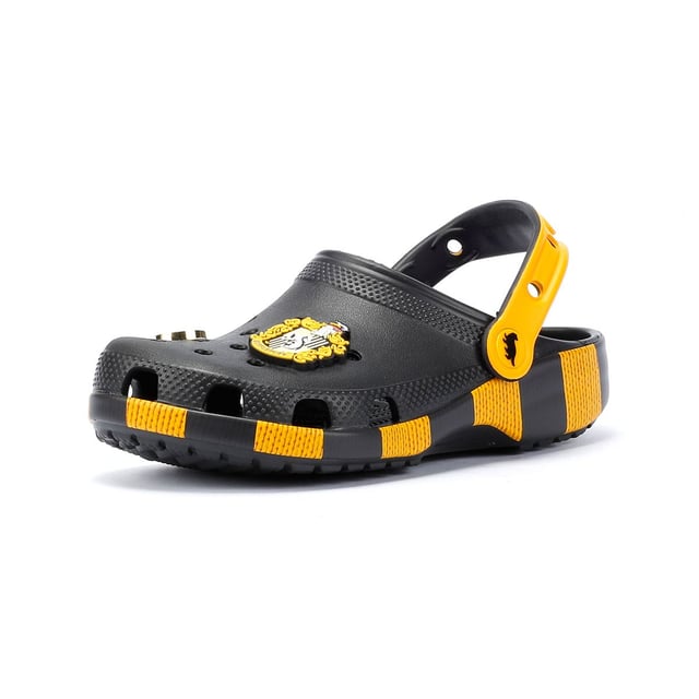 Inspired by Harry Potter’s Hufflepuff House scarf in yellow and black, these Classic Clogs are lightweight, water-friendly, and buoyant. Featuring breathable ventilation ports and pivoting heel straps for a secure fit, they're perfect for fans seeking style and comfort. Customisable exclusive Hufflepuff-inspired Jibbitz™ charms.