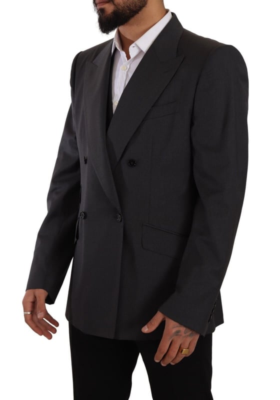 Absolutely stunning Dolce & Gabbana blazer
  Peak lapel style
  Brand new with tags
  SICILIA collection
  Double-breasted design with blazer and vest
  Slim fit
  Grey color
  Logo details
  Made in Italy
  Quality craftsmanship
  Material: 98% Virgin Wool 2% Elastane
  Lining: 85% Silk 15% Viscose
Material: 98% Virgin Wool 2% Elastane