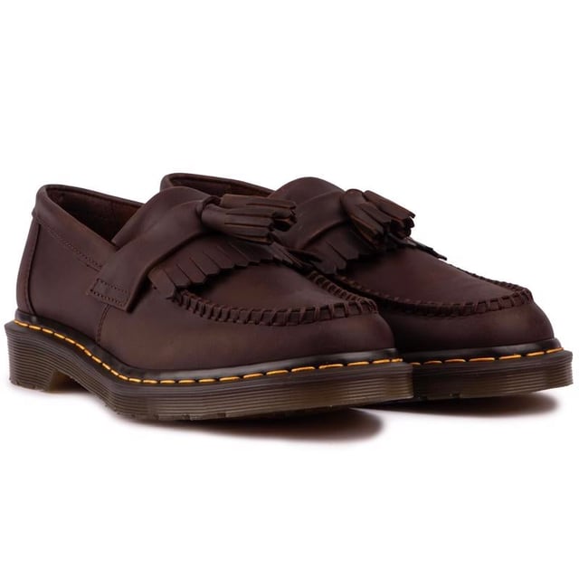 These Women's Brown Dr. Martens Adrian Tassel Loafer, With A Quality Leather Upper, Featuring An Elaborate Fringe And Tassel Adornment And Eye-catching Stitching. These Ladies' Shoes Have A Goodyear Welted Air-cushioned Sole With A Rugged Tread.