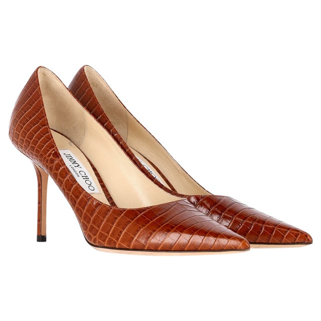 VINTAGE, RRP AS NEW
Elevate your ensemble with the Jimmy Choo Croc Embossed Love Pumps in luxurious brown leather, featuring an alluring croc-effect finish and a sophisticated pointed toe design for a touch of timeless elegance.


Jimmy Choo Croc Embossed Love Pumps in Brown Leather
Condition: Very good
Signs of wear: Minor markings, Lightly used but very well maintained. Minor mark at soles & creasing, light scuffing at the soles and heels.
Packaging: None
Color: Brown 
Material: Leather | leather
Size: EU39/US9
Measurements: Heel height: 90; Insole length: 290
SKU: NAPPUGBSH386163W