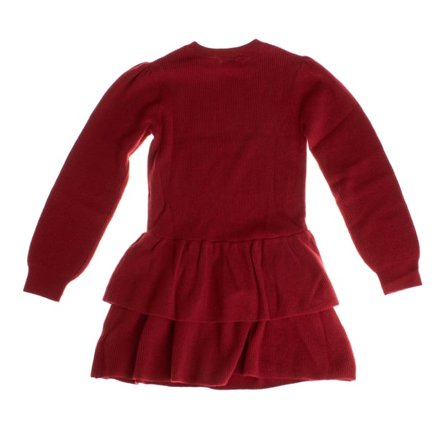 This elegant girl's dress is made from a thick knit fabric, ideal for cool climates.

 Its design includes long sleeves with slight gathering on the shoulders, adding a delicate and feminine touch.

 The top of the dress has a fitted fit, while the skirt is made up of two ruffles, creating a beautiful layered effect with volume, which adds movement and style to the garment.

 The round neck and no additional embellishments design make this dress versatile and easy to pair for formal or casual occasions.

 It is a perfect garment for autumn or winter, combining fashion and comfort, ideal for keeping girls warm and stylish at the same time.
 Composition: 53% Cotton, 43% Nylon
 Care:
- Hand wash or delicate cycle.
 - Use mild detergents.
 - Do not use a dryer.
 - Iron at low temperature.
 - Do not dry clean.