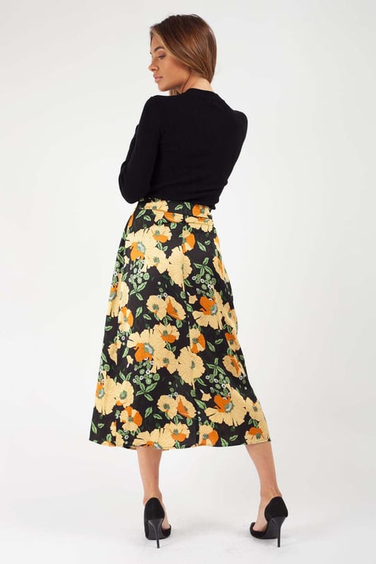 Flaunt a floral print in this wrap midi skirt. Pair with a white tee and trainers for a chic day time look. Dress up with bralet or cami for sophisticated evening look.