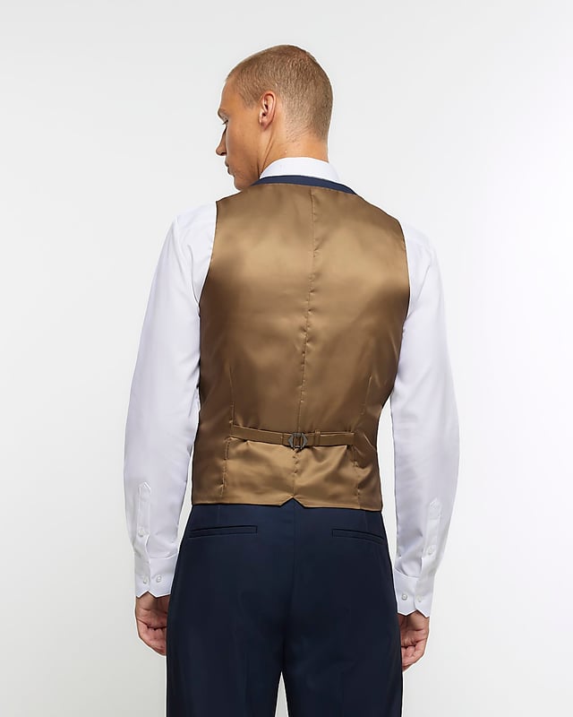 Two-Tone, Button fastening, V hem, Front welt pockets, Lined, Adjustable back fastening, Skinny fit, Our model wears a UK 40R and is 185.5cm/6'1'' tall, Made with at least 30% recycled material