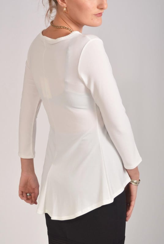 This peplum top is a simple way to work the peplum trend. In a stretchy material and with flattering 3/4 length sleeves, and dipped hem this top is comfortable and stylish

95% Polyester - 5% Elastane
Smooth Stretch Lightweight Jersey
Sizing: As expected
Length: Front 23" Back 26" Shoulder to Hem (Dipped Hem)