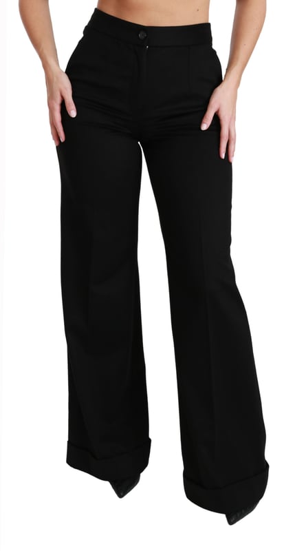 Brand: Dolce & Gabbana
  Condition: Brand new with tags
  Authenticity: 100% Authentic
  Style: High Waist Wide Leg Flared Pants
  Fit: Regular fit
  Material: 100% Cashmere
  Color: Black
  Closure: Zipper button fly
  Details: Logo details
  Origin: Made in Italy
  Gender: Women
Material: 100% Cashmere