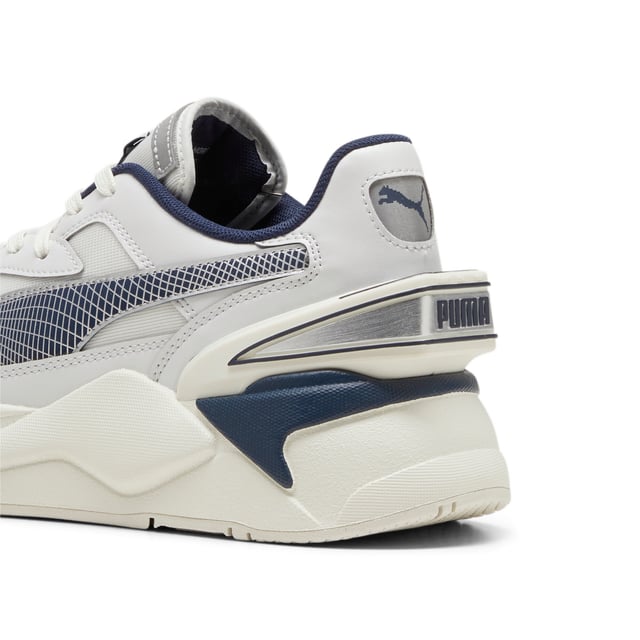 PRODUCT STORY: RS-X is back. This future-retro silhouette made waves when it dropped in 2018, celebrated for its disruptive design, fresh material mixes, and bold colors. Today, RS-X returns for a new generation of consumers who live to express their individuality. It’s here to start a revolution of self-expression. This shoe celebrates the 40th Anniversary of the RS technology paying homage to the original RS-Computer and features a mesh base with synthetic overlays, and reflective details. FEATURES & BENEFITS: Vegan certified product; The upper of the shoes is made with at least 30% recycled materials; Running System: PUMA's comfortable cushioning technology celebrates the reinvention of a unique moment and movement in culture. DETAILS: Mesh upper; Synthetic overlays; Reflective heel and reflective toe underlay; TPU heel; Mesh lining; Mesh sockliner; Platform toe; Lightweight PU midsole; Rubber outsole.