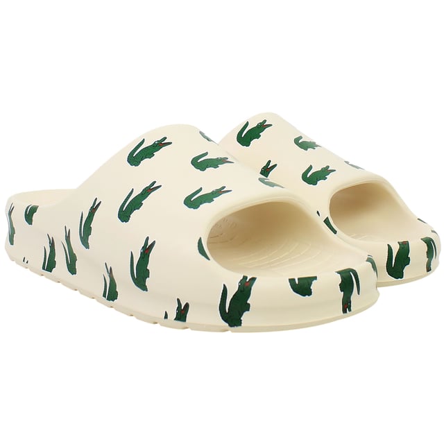 The Lacoste Serve Slide 2.0 223 3 SMA Men's Beige Sliders blend casual comfort with understated elegance, making them a perfect choice for laid-back occasions. With their neutral tone and premium build, these sliders are versatile for home, beach, or poolside use.
Â 
Key Features:
Ergonomic Footbed: 

Designed for superior comfort and support, ensuring a relaxed fit throughout the day.


Durable Synthetic Strap: 

Embossed with the iconic Lacoste crocodile logo, adding a touch of signature style.


Slip-On Design: 

Offers easy on-and-off convenience, ideal for leisure and quick outings.


Textured Rubber Outsole: 

Provides reliable grip and stability on various surfaces, including wet environments.


Lightweight Construction:

Minimizes fatigue, making these sliders comfortable for prolonged wear.


Water-Resistant Material: 

Perfectly suited for poolside, shower, or beach settings, offering durability against water exposure.


Neutral Beige Colorway: 

A versatile and subtle shade that complements a wide range of casual and summer outfits.


Â 
The Lacoste Serve Slide 2.0 223 3 SMA Men's Beige Sliders are a stylish and practical option for relaxed days, combining iconic branding with everyday functionality. Perfect for adding a modern, minimalist touch to your leisure footwear.