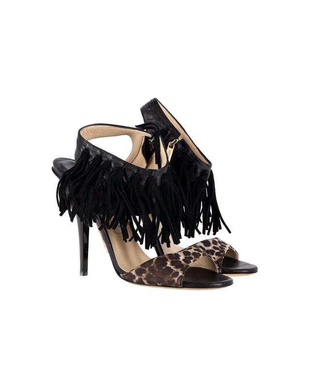 VINTAGE, RRP AS NEW
Add a touch of wild elegance to your footwear collection with the Jimmy Choo Leopard-Print Fringe Sandals. The leopard print is a bold choice that instantly elevates any outfit. The fringed details add a bohemian and eclectic touch, giving these sandals a unique and playful vibe. With an open-toe design and high heels, they are both stylish and flattering.

Jimmy Choo Leopard-Print Fringe Sandals in Black Leather
Condition: Very good with box
Sign of wear: Light wear on the soles and insoles, marks on the heel
Material: Leather
Color: Black
Size: IT36.5 / US6.5 / UK3.5
SKU: 357150 / TONPUGBSH357150W
