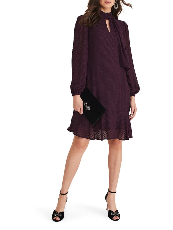 Elevate your wardrobe with the luxurious Everly Swing Dress - a textured piece in a rich plum shade perfect for any casual occasion.