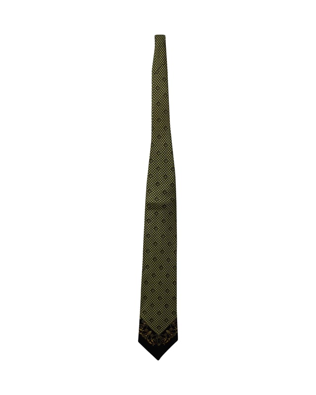 VINTAGE, RRP AS NEW
This Gianni Versace tie is a perfect formal accessory that has a sharp and modern appeal. Made from luxurious materials, it features intricate patterns, and the brand label is neatly stitched at the back. It is sure to add oodles of style to your blazers.

Gianni Versace Printed Tie in Yellow and Black Silk 
Condition: Excellent
Sign of wear: No
Color: Black and yellow
Material: Silk
Measurement: L 1480 x H 80mm 
SKU: 168964