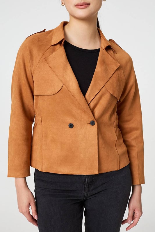 Add an extra layer lo your look with this cropped jacket. It's made from a soft suede feel fabric; and you can wear it over any outfit, including formal dresses or eveningwear. It has a lapel collar and button details, with long sleeves and a fitted shape. Pair this cropped jacket with smart trousers and you can wear it to work too.