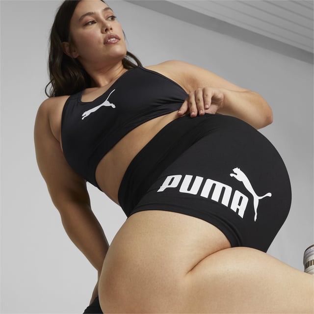 PRODUCT STORY: A good pair of short leggings can put you in the mood to get out there and break a sweat. Made of a soft cotton blend, these Essentials Logo Women's Short Leggings have a 7-inch inseam and come in a tight fit for a serious athleisurewear look. Throw an oversized sweater over the top for a relaxed, chic aesthetic. A PUMA No. 1 Logo on the left thigh is the finishing touch. DETAILS: Tight fit with 7" inseam; Elastic waistband for a form-fitting look; Rubber print PUMA No. 1 Logo on left thigh.