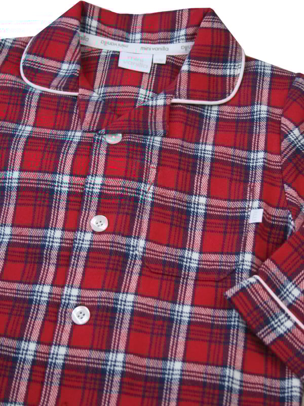 Explore our classic Boy's Red Check Traditional Pyjamas. These timeless and comfortable pyjamas set are perfect for a cosy night's sleep. Our pyjamas feature soft fabrics and stylish designs. Shop now for the perfect sleepwear for your little one