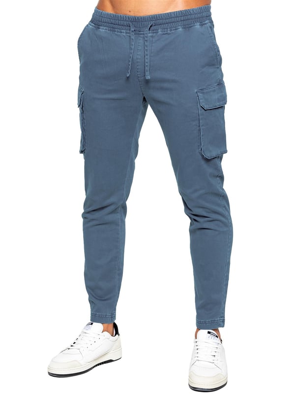 Enzo | Mens Cargo Tracksuit Set Enzo Mens Cargo Outfit Set. Long Sleeved, Zip Up, Collared, Cargo Overshirt. Two Front Flat Cargo Pocket With Velcro Fastening. Two Side Welt Pockets. Stitched Trims On Sleeves And Hemline. Set Completed With Cargo Trousers. Regular Fit, Straight Leg, Enzyme Wash. 5 Pocket Design. 2 Side Pockets, 2 Cargo Pockets With Velcro Fastening. Single Back Welt Pocket. Elasticated Waistband With Adjustable Drawstring
