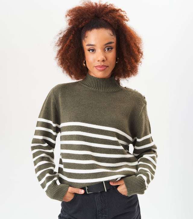 Stay cozy and stylish with ou High Neck Stripe Oversized Jumper. This fashionable sweater features a high neck design and classic stripes, perfect for any fashion-forward individual. The oversized fit adds a touch of trendiness to your wardrobe. Stay warm and look great all season long.MeasurementApprox. length- 75cm