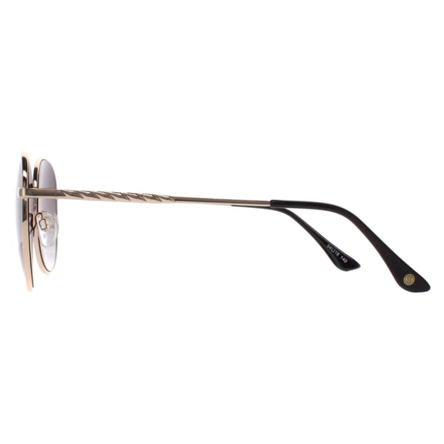 Smarty Round Unisex Gold Grey X1116  Sunglasses Elevate your style with SMARTY Designer Sunglasses model X1116B, perfect for both men and women who appreciate timeless elegance. These round-shaped sunglasses feature a luxurious gold metal frame paired with sophisticated grey gradient lenses, offering superior UV protection and a chic, polished look. The X1116B model combines classic design with modern comfort, making them ideal for any occasion. Available at an unbeatable discount from the regular retail price, these designer sunglasses provide exceptional quality and value. Enhance your accessory collection with SMARTY and enjoy luxurious sun protection that complements your unique style.
