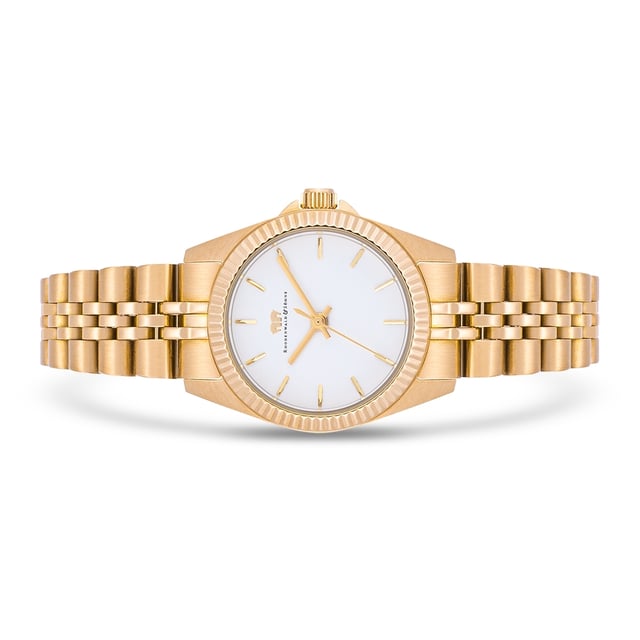 Would you like a women's watch that combines timeless optics with the quality standards of the old watchmaker's art? Then this timepiece of the Rhodenwald & Sons label is a good choice. The watch manufacturer designs stylish and sustainable masterpieces for all generations: the model inspires with a tidy dial made of mother-of-pearl, filigree barnities, obélisque devices and a grooved bezel. The satined stainless steel housing with IP finishing in yellow gold and a tuned link bracelet made of stainless steel are conclusive into the design concept. A precise quartz watchwerk, a screwed housing floor and waterproof up to 5 ATM make the equipment perfect.