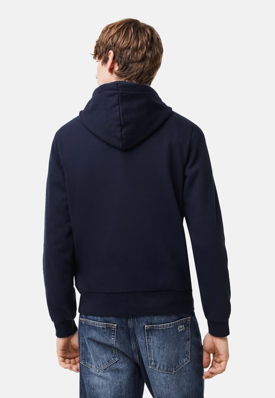 Trendy, warm, lightweight: a must-have for the crocodile wardrobe. Plain-coloured hooded sweatshirt with a kangaroo pocket and logo patch in a modern silhouette.