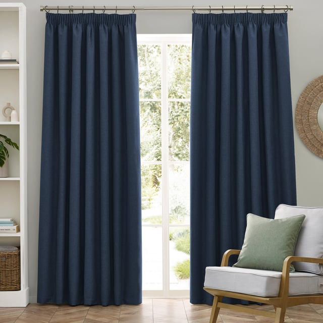 Transform your living space with Dawn Blackout Pencil Pleat Curtains, designed for those who value elegance and practicality. Crafted from soft-textured fabric with a modern marl effect, these curtains add refined style to any room while effectively blocking out light. Perfect for a restful night's sleep or creating the ideal movie-watching environment, their temperature-regulating properties ensure comfort year-round by keeping your home cool in summer and warm in winter. Enjoy the perfect blend of function and style with Dawn Blackout Curtains.