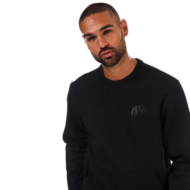 Mens Armani Exchange Placed Print Colourblock Sweatshirt in black.- Crew neck.- Long sleeves.- Front kangaroo pocket.- Colorblocking at backs of arms.- AX logo on chest.- 69% Cotton  31% Polyester. Machine washable. - Ref: 3ZZMANJQ2Z1200