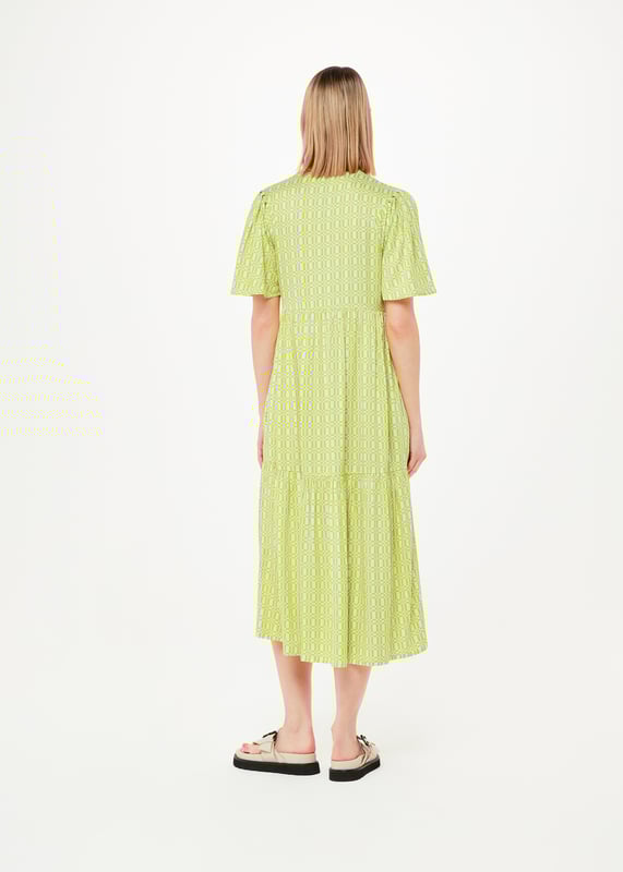 Elevate your style with our Link Trapeze Dress, perfect for any casual setting with its comfortable fit and vibrant pattern.